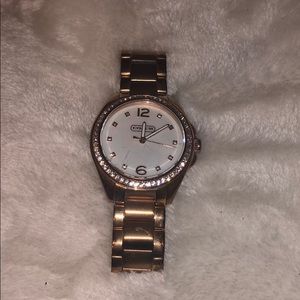 Rose gold coach watch
